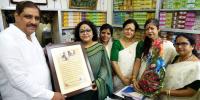 কবি নজরুলের প্রিয় সুগন্ধির দোকানের স্বত্বাধিকারীর হাতে স্মারক প্রদান