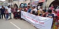 আক্কেলপুরে দিনমজুর শ্যামল হত্যার বিচারের দাবিতে মানববন্ধন