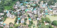 বন্যায় পানিবন্দি লাখ লাখ মানুষ